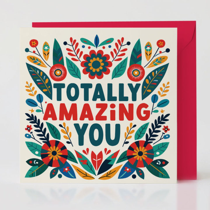 Totally Amazing You card standing with its bold 'Poppy' red envelope, a vibrant celebration of someone’s amazing qualities.