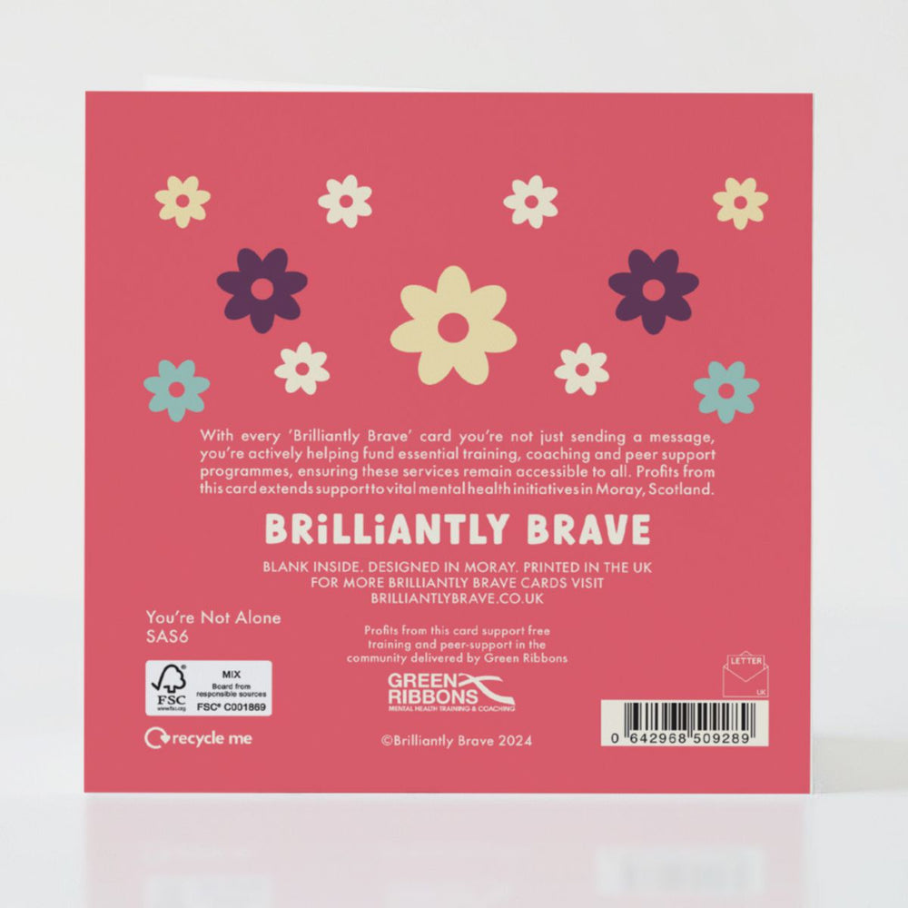 You're Not Alone - Back of the card with thoughtful design and care-filled details.