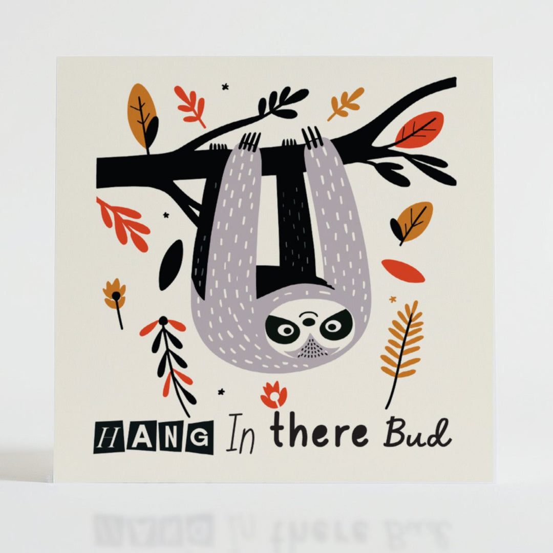 Hang in There - Supportive card featuring a relaxed sloth with an encouraging message about perseverance.