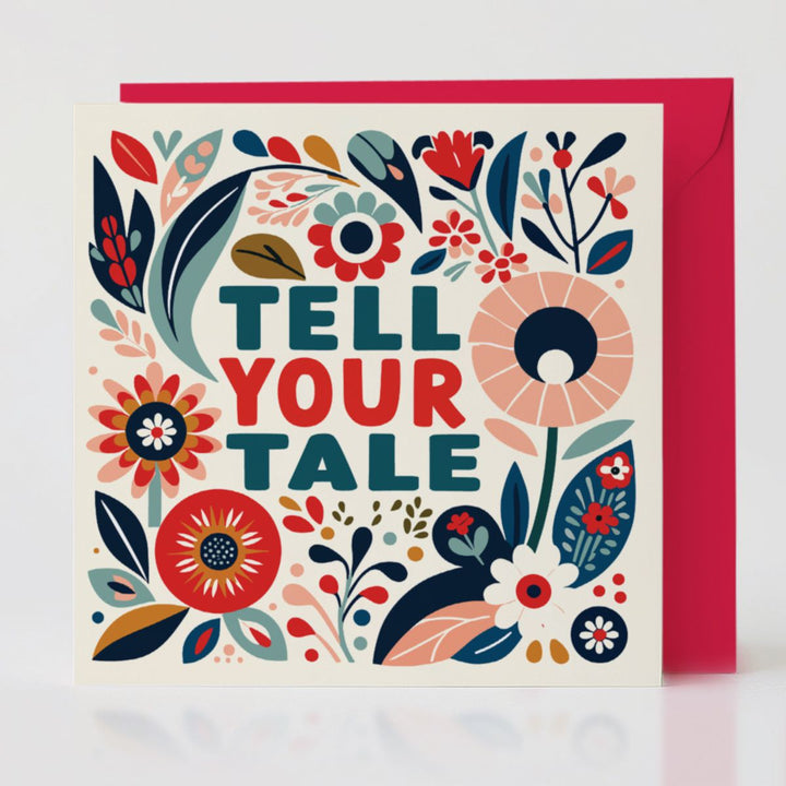 Tell Your Tale card standing with its vibrant 'Poppy' red envelope, inspiring connection through storytelling.