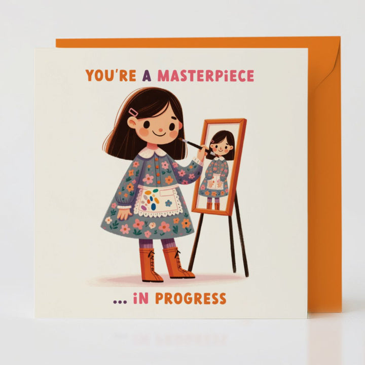 Masterpiece card with orange envelope, perfect for celebrating the journey of creating.