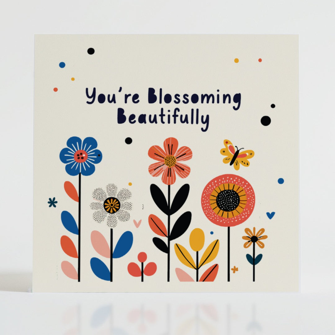 Blossoming Beautifully - Inspirational card featuring delicate florals celebrating transformation and personal growth.