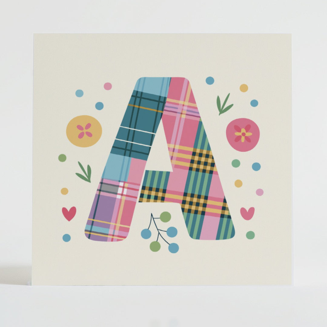 Mental health card featuring a bold A design with a tartan pattern and uplifting message.