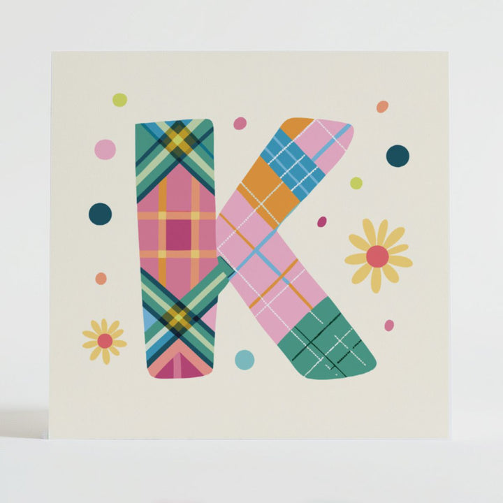 Tartan Pop Letter K - Mental health card featuring a bold K design with a tartan pattern and uplifting message.