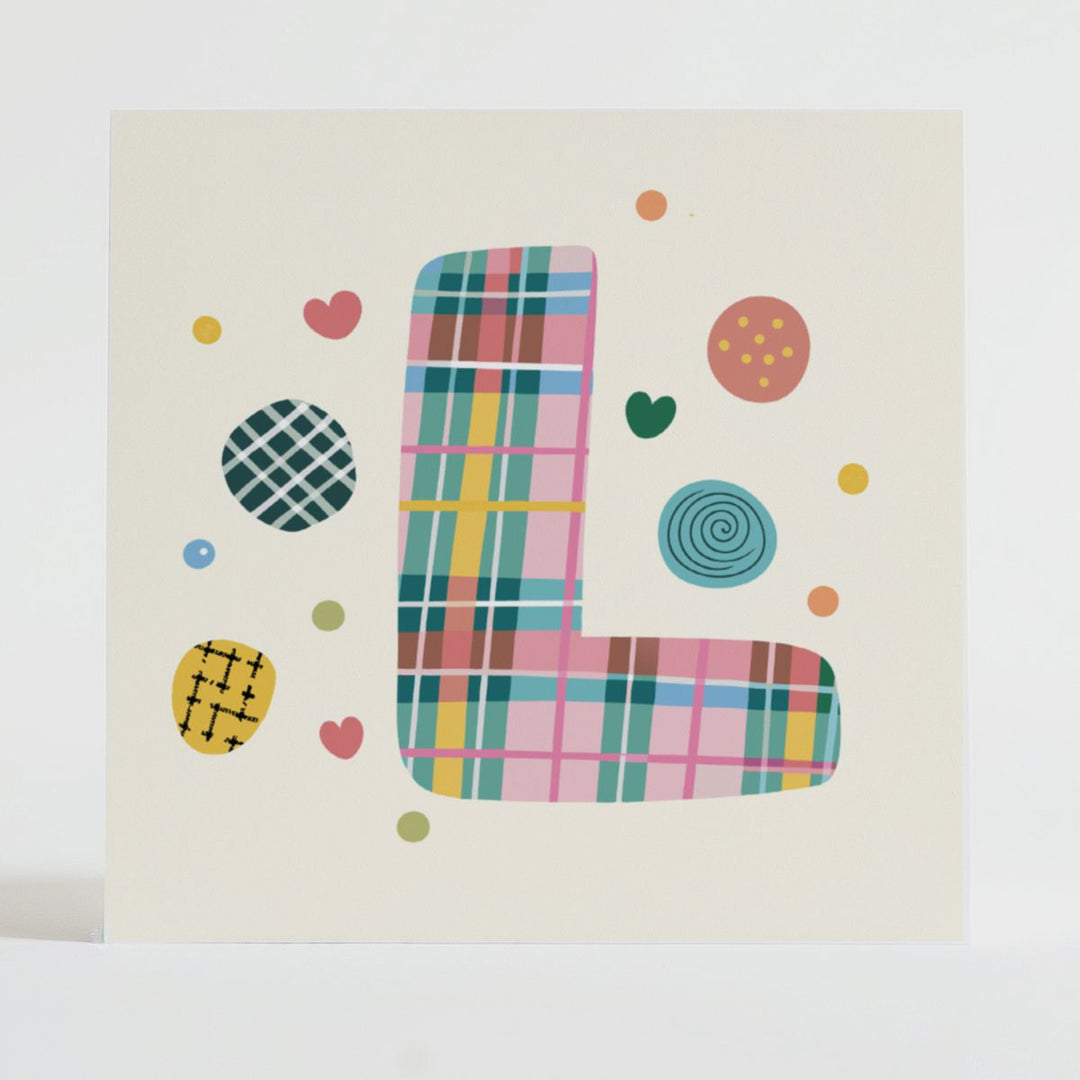 Tartan Pop Letter L - Mental health card featuring a bold L design with a tartan pattern and uplifting message.