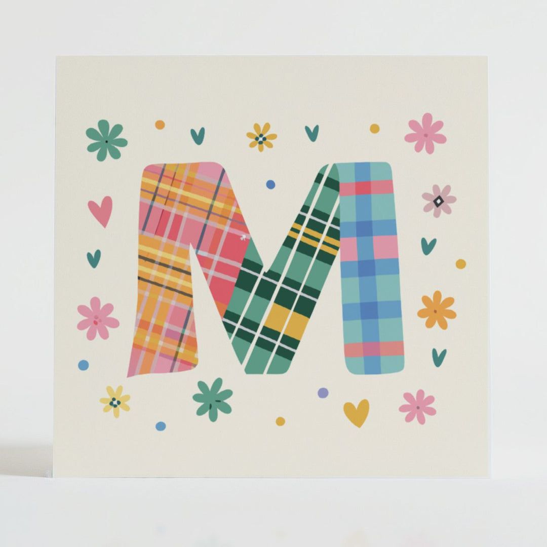 Tartan Pop Letter M - Mental health card featuring a bold M design with a tartan pattern and uplifting message.