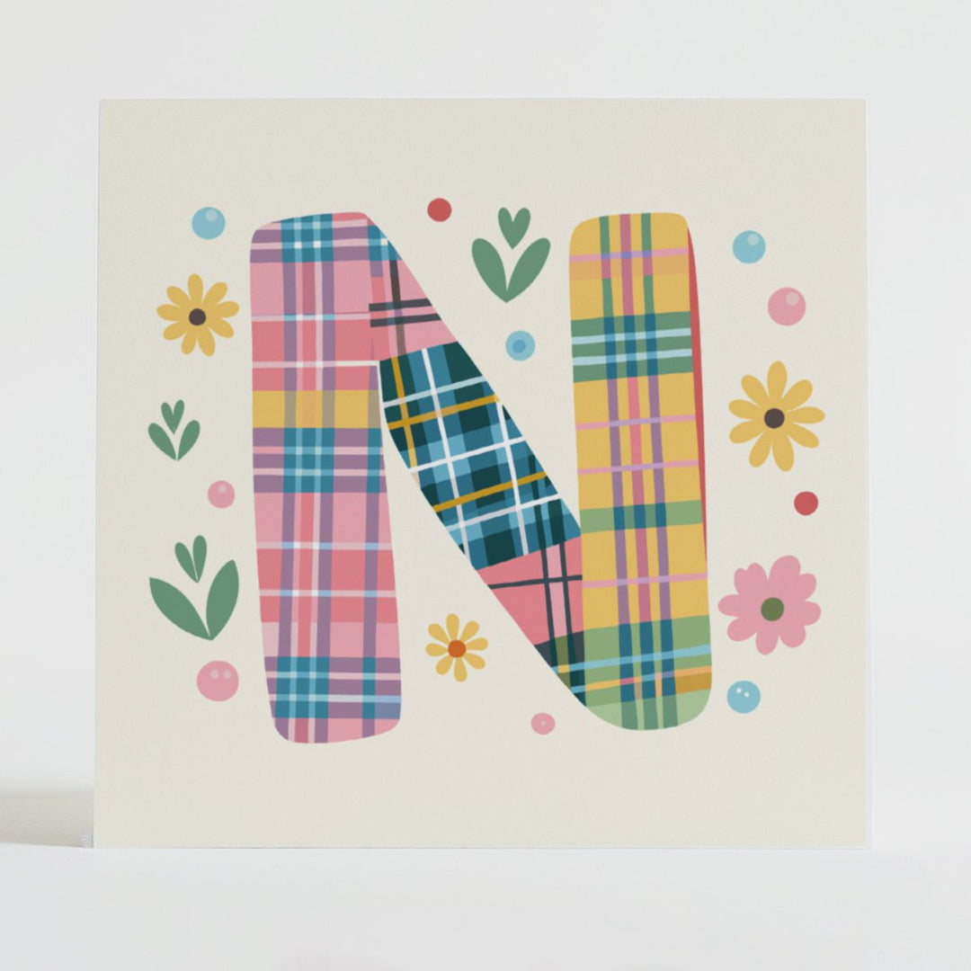 Tartan Pop Letter N - Mental health card featuring a bold N design with a tartan pattern and uplifting message.