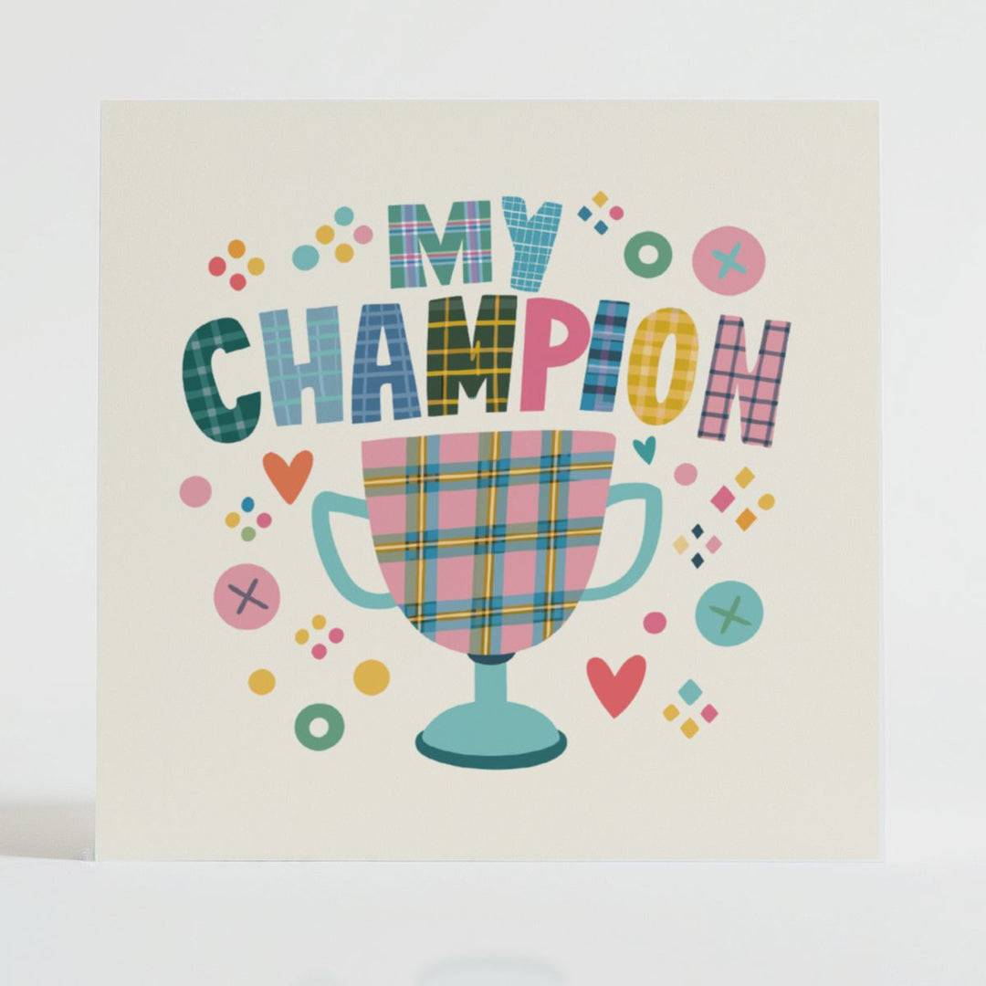 My Champion - Achievement card featuring a unique tartan design and message reflecting brilliance.