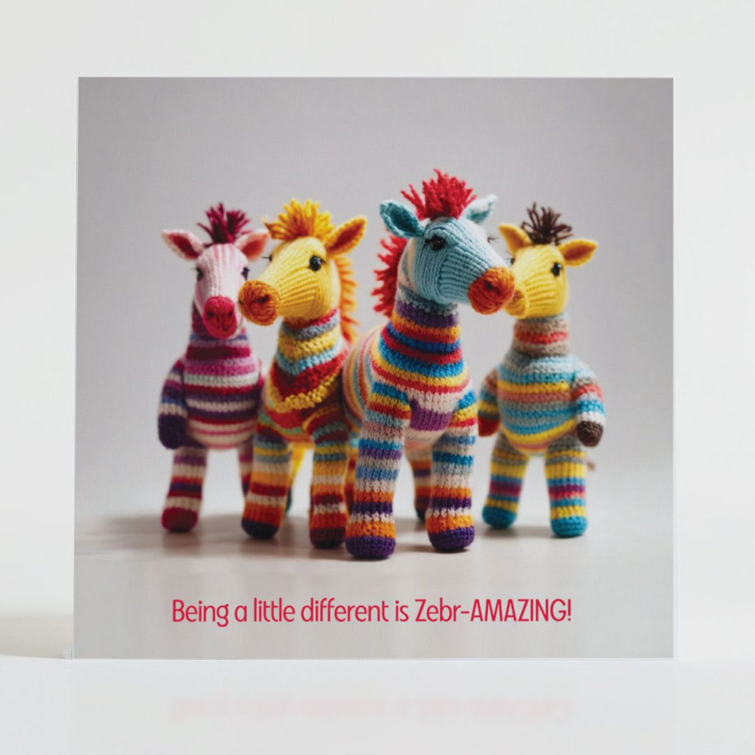 Zebr-Amazing - Positive vibes card with uniquely striped, hand-knitted zebras celebrating individuality.