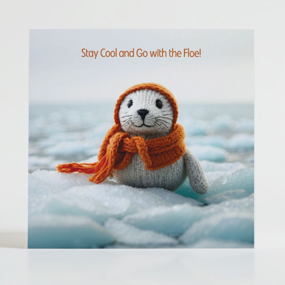 Go with the Floe - Encouragement card featuring a cosy knitted seal wrapped in a scarf for calm and resilience.